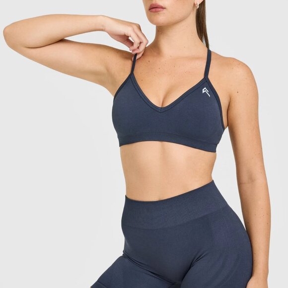 EnhanceLift™ Seamless Strappy Sports Bra with White Logo - Picture 1 of 6